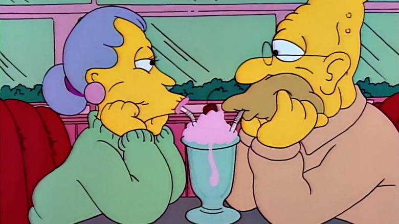 Grampa Simpson drinks a milkshake with Bea in "Old Money"