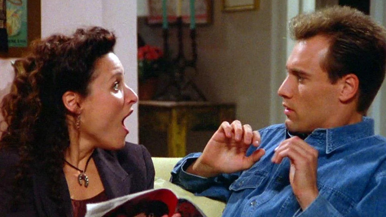 Julia Louis-Dreyfus as Elaine staring in shock at Anthony Cistaro as Joel in Seinfeld