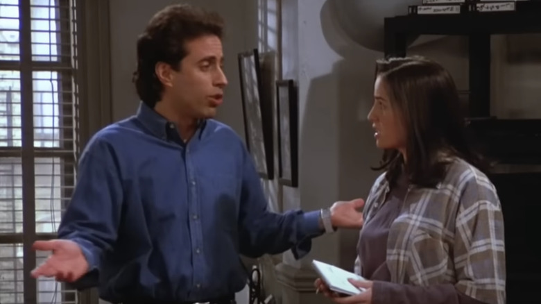Jerry Seinfeld as Jerry talking to Paula Marshall as Sharon in Seinfeld