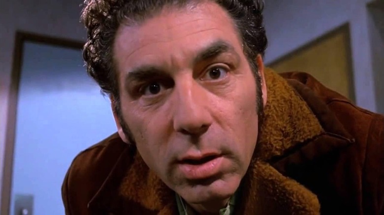 Cosmo Kramer (Michael Richards) looks closely into the camera on Seinfeld