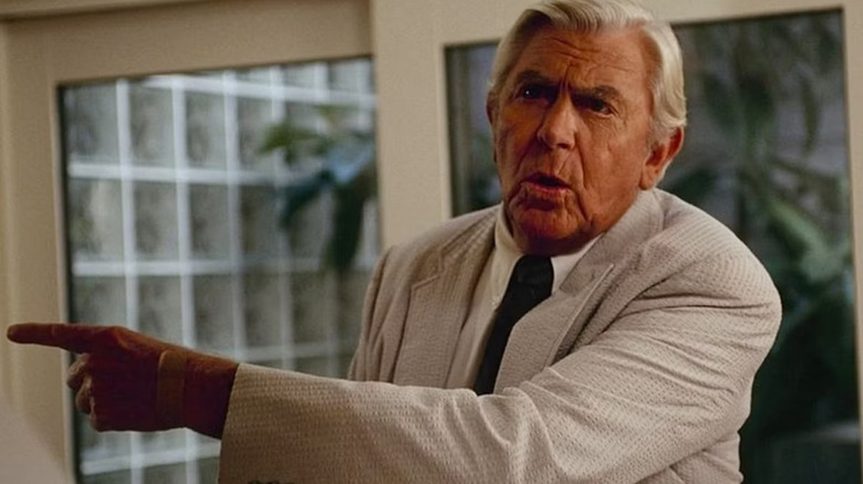 Andy Griffith as Ben Matlock, pointing somewhere in Matlock.