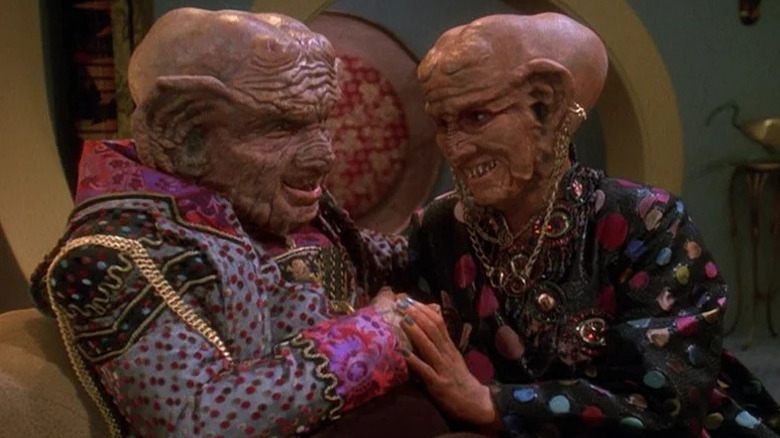 The Grand Nagus Zek (Wallace Shawn) cozies up with Ishka (Cecily Adams) in Star Trek: Deep Space Nine