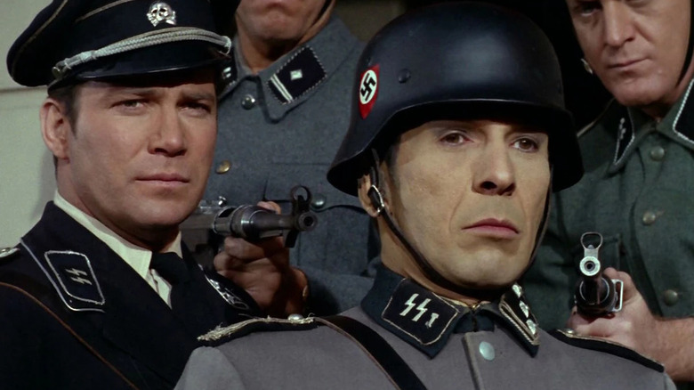Jim Kirk (William Shatner) and Spock (Leonard Nimoy) wear Nazi uniforms on Star Trek: The Original Series