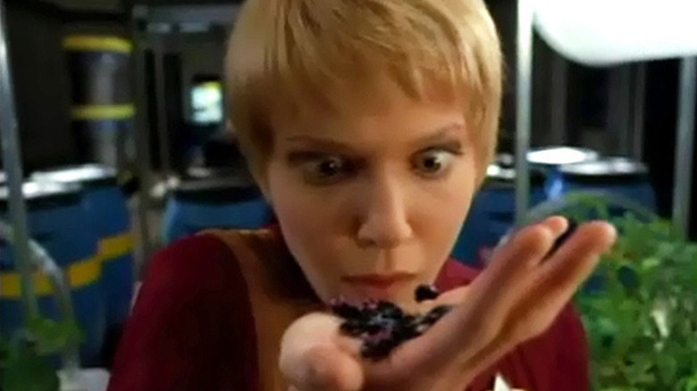 Kes (Jennifer Lien) examines strange bugs in Star Trek: Voyager