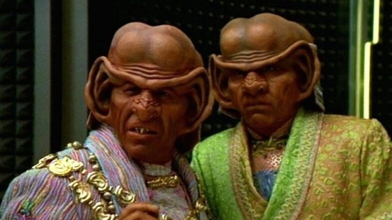 Arridor (Dan Shor) and Kol (Leslie Jordan) stand together in Star Trek: Voyager