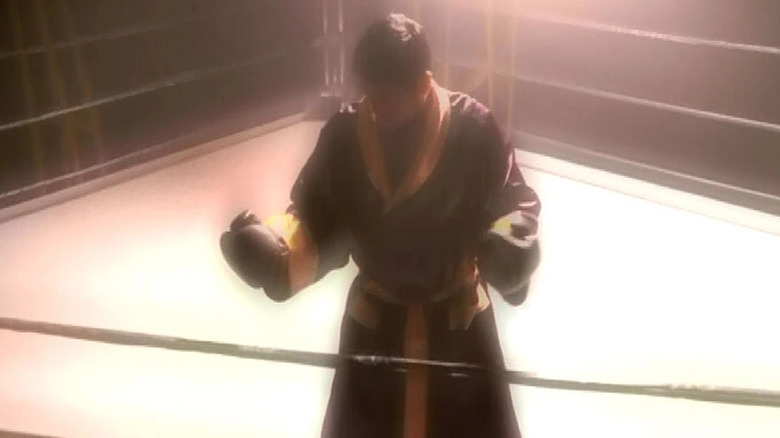 Chakotay (Robert Beltran) stands in a boxing ring in Star Trek: Voyager