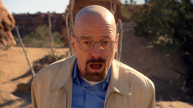 Bryan Cranston as Walter White, appearing shocked in the desert in Breaking Bad.