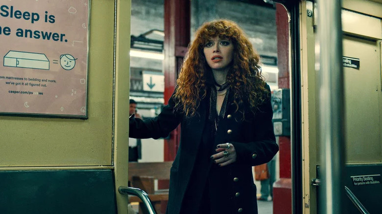 Natasha Lyonne's Nadia Vulvokov boarding a subway train on Russian Doll