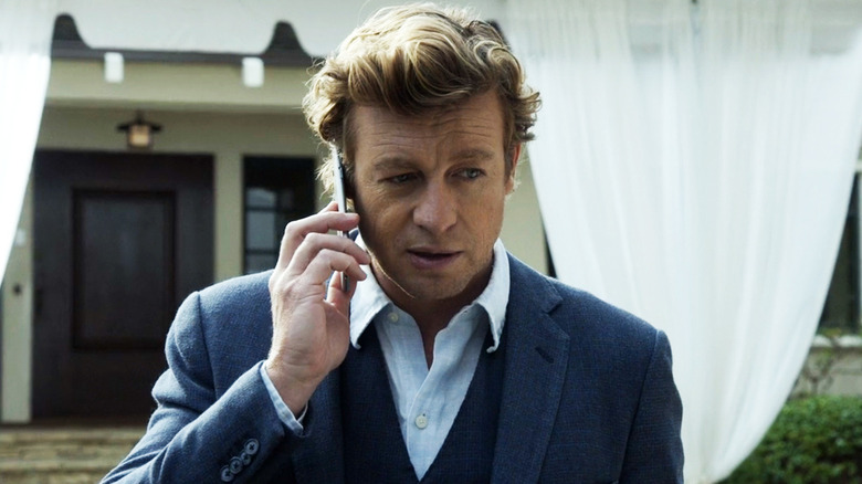 Patrick Jane (Simon Baker) takes a call in The Mentalist