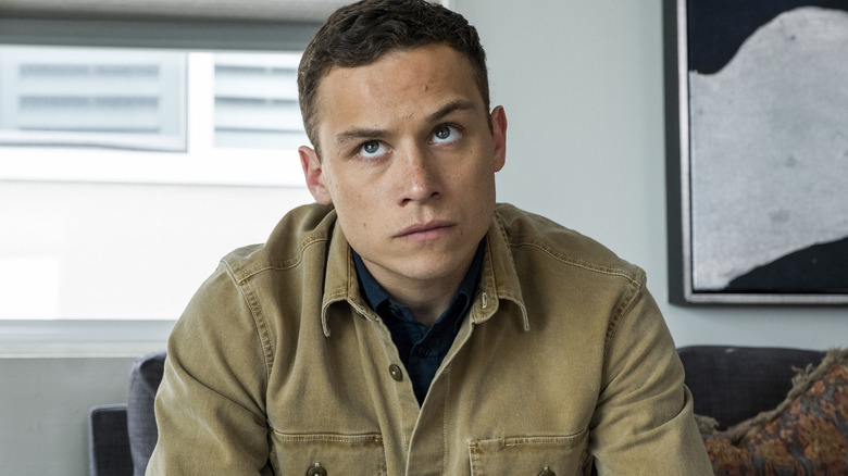 J (Finn Cole) listens to instructions on Animal Kingdom