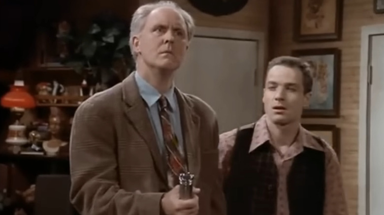 Dick (John Lithgow) and Harry (French Stewart) in the living room on 3rd Rock from the Sun