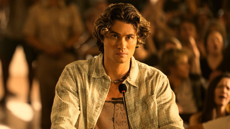 Chase Stokes as John B getting ready to speak in Outer Banks