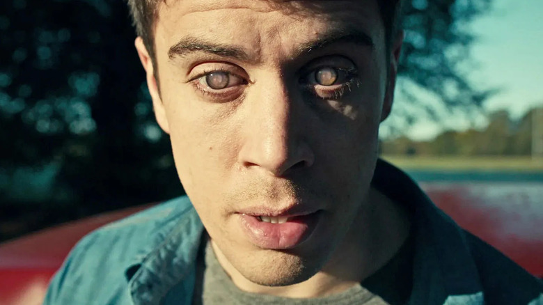 Liam Foxwell (Toby Kebbell) looks through digital memories in The Entire History of You from Black Mirror