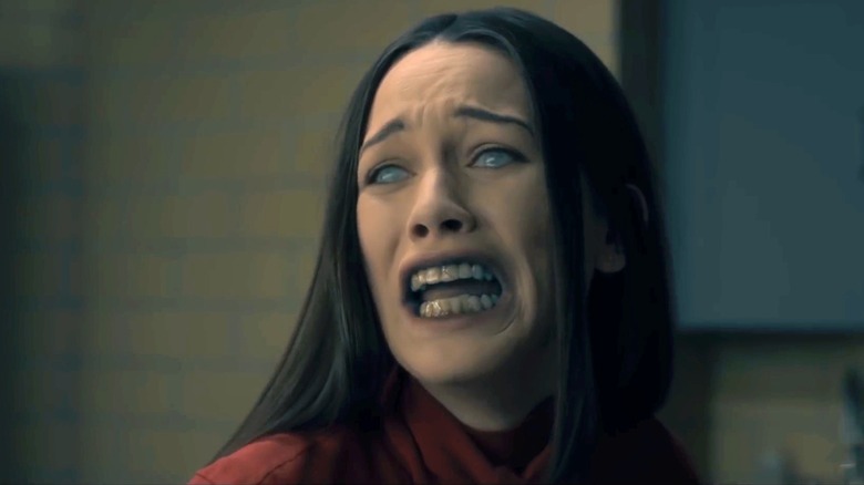Nell (Victoria Pedretti) screams, haunted, in The Haunting of Hill House