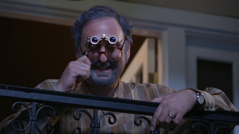 Dan Dimler (Eric Wareheim) peeps through binoculars in Tim and Eric's Bedtime Stories episode Angel Boy