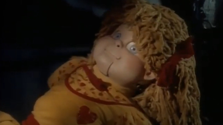 Evil robot doll Holly, played by Michael J. Anderson, in Monsters