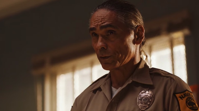 Joe Leaphorn (Zahn McClarnon) looks up in his office in Dark Winds