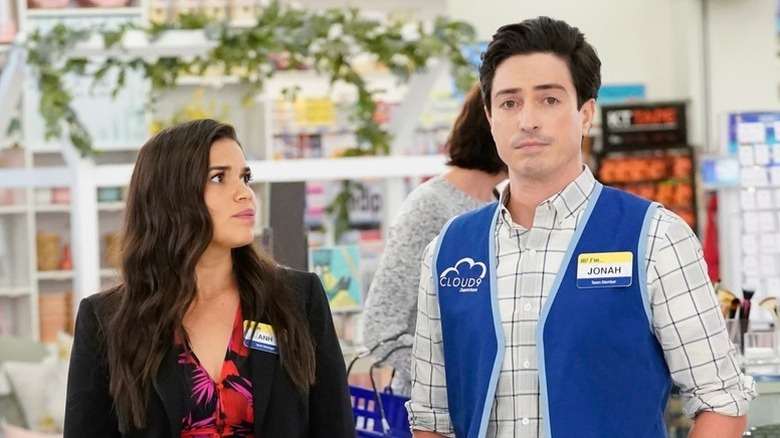 Amy Dubanowski (America Ferrera) glances at Jonah Simms (Ben Feldman) in Superstore