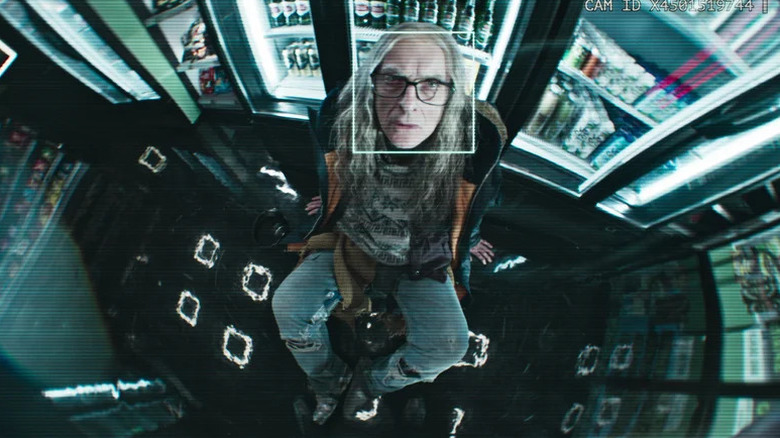 Cameron Walker (Peter Capaldi) gazes into a security camera in Black Mirror