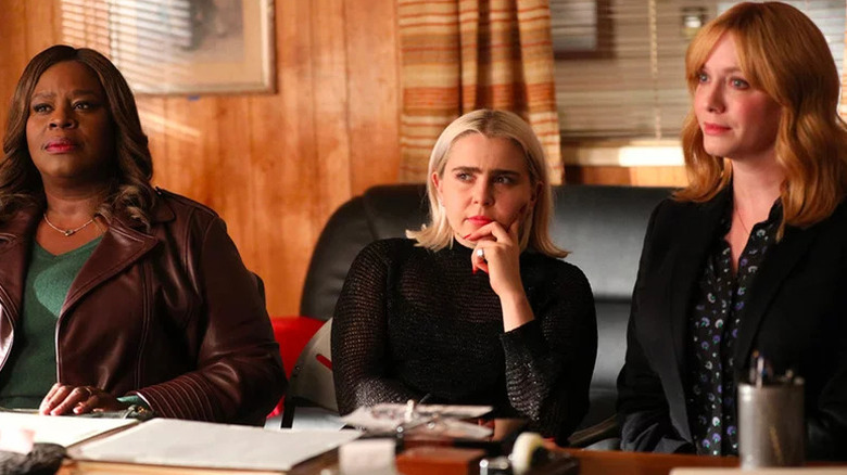 Retta as Ruby, Mae Whitman as Annie, and Christina Hendricks as Beth sitting in front of desk in Good Girls