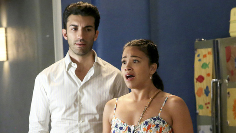 Justin Baldoni as Rafael and Gina Rodriguez as Jane looking shocked in Jane the Virgin