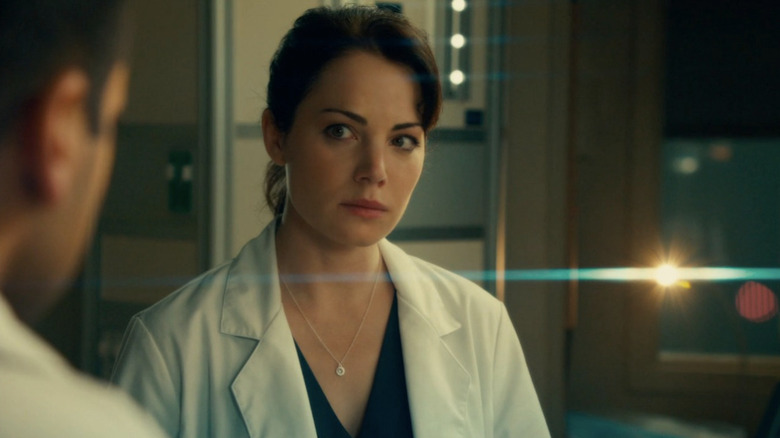 Erica Durance as Alex in white doctor's coat in "Saving Hope."