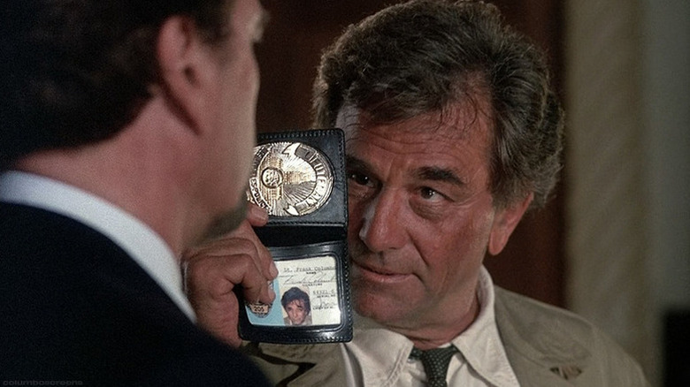 Peter Falk as Columbo flashing his badge in Columbo