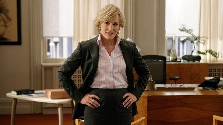 Glenn Close as Patty standing in suit standing in office in Damages