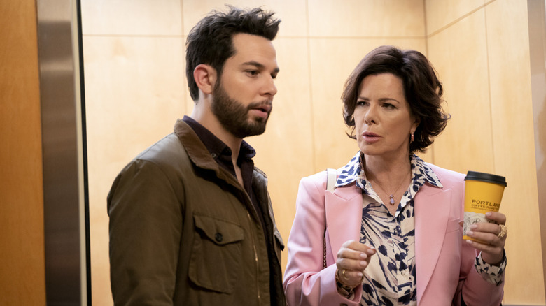 Skylar Astin as Todd pointing at something next to Marcia Gay Harden as Margaret in So Help Me Todd