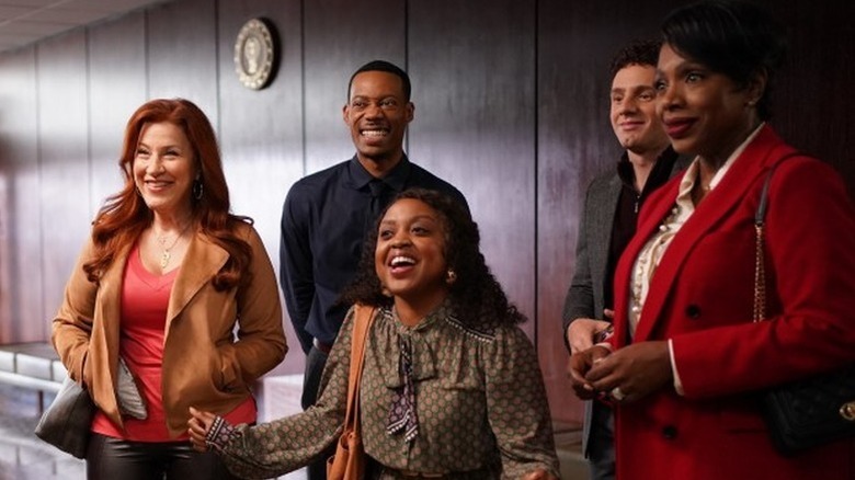 Janine, Gregory, Melissa, Jacob, and Barbara smile at someone in "Abbott Elementary"