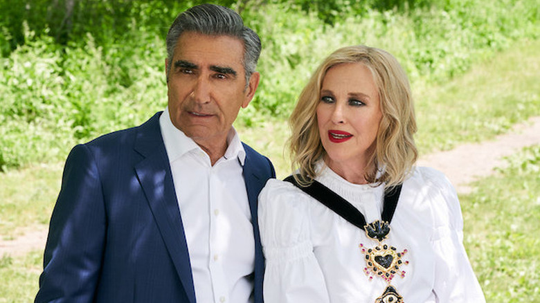 Johnny and Moira Rose converse with each other in "Schitt's Creek"