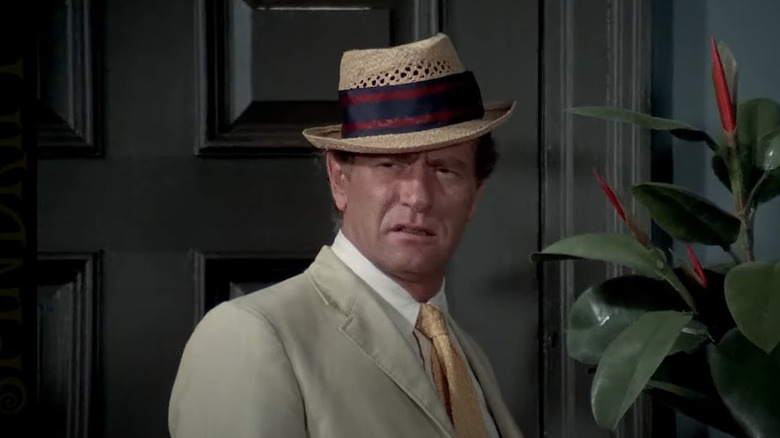 Carl Kolchak looking on in disbelief