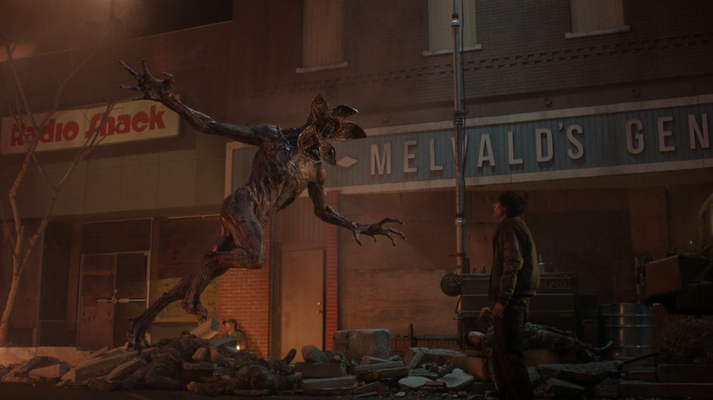 A Demogorgon attacking Mike Wheeler