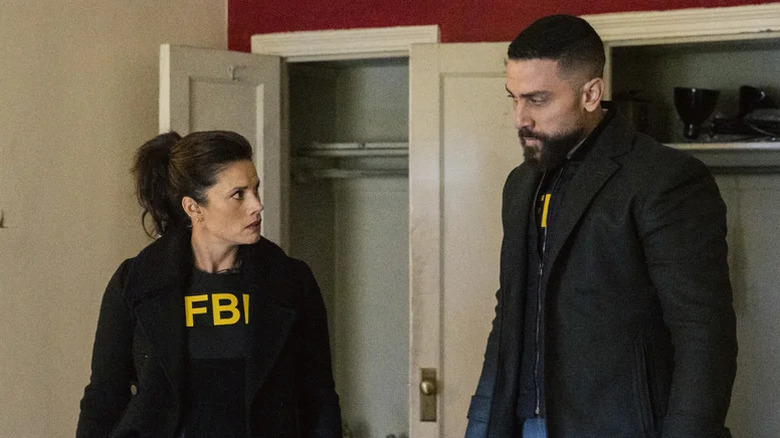 Missy Peregrym's Maggie Bell and Zeeko Zaki's OA Zidan looking weary and wearing FBI vests on FBI
