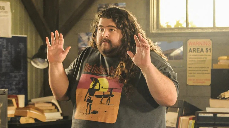 Jorge Garcia's Jerry Ortega raising his hands on Hawaii Five-0