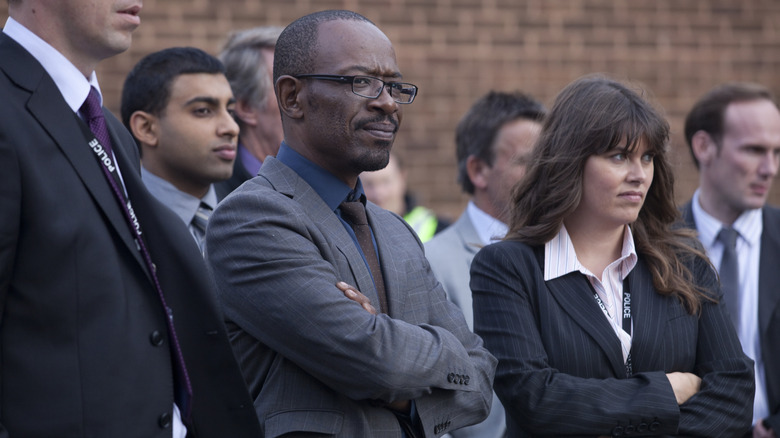 DCI Tony Gates (Lennie James) and DS Leah Janson (Claire Keelan) standing together with arms crossed in Line of Duty