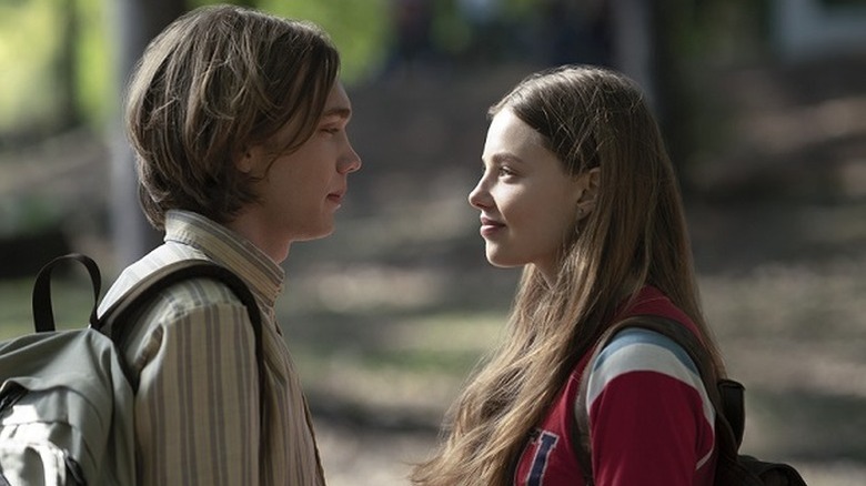 Charlie Plummer as Miles standing in front of Kristine Froseth as Alaska in Looking For Alaska
