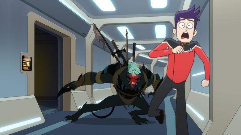 Brad Boimler flees a Predator-like hunter on Star Trek: Lower Decks.
