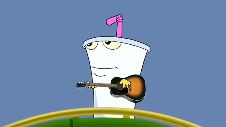 Master Shake smiles while holding a guitar in Aqua Teen Hunger Force