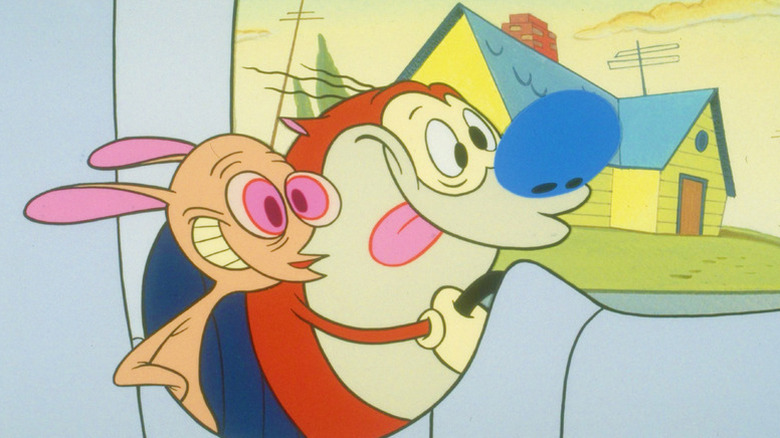 Ren sits next to Stimpy as he drives a car in The Ren & Stimpy Show