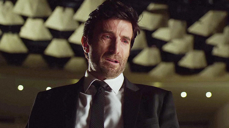 An emotionally distraught Christian Walker stares down