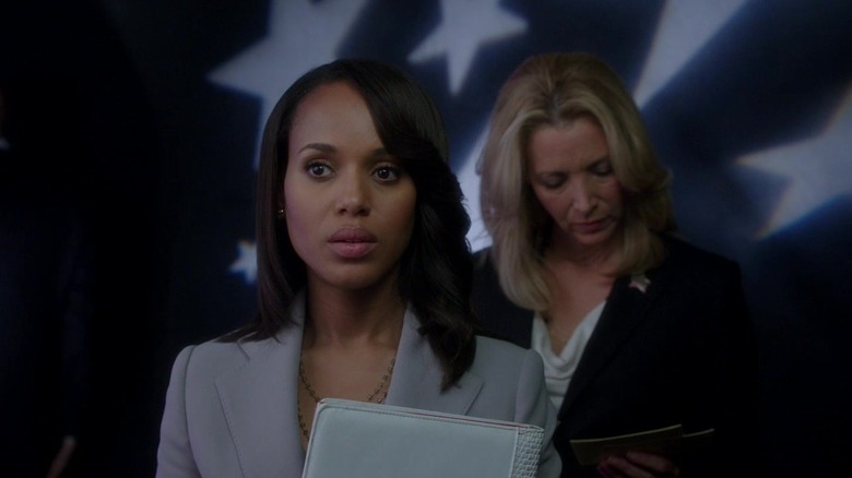 Kerry Washington as Olivia Pop standing in front of Lisa Kudrow as Josie Marcus in Scandal