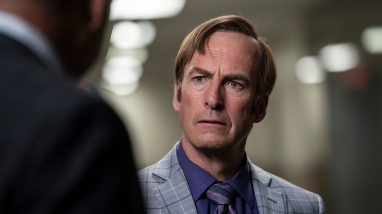 Saul Goodman (Bob Odenkirk) stares in disbelief at a man in Better Call Saul