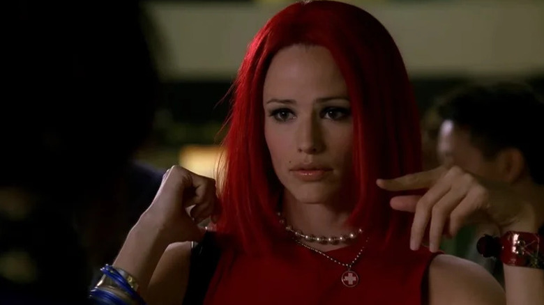 Jennifer Garner wearing bright red wig as Sydney Bristow in Alias