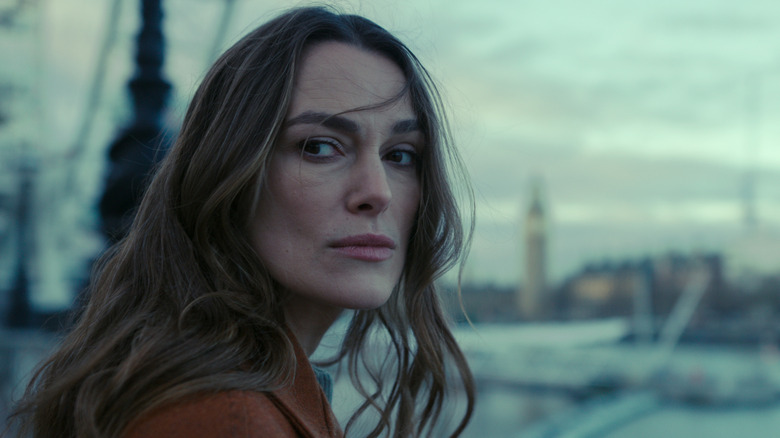Keira Knightley as Helen looking stoic in Black Doves