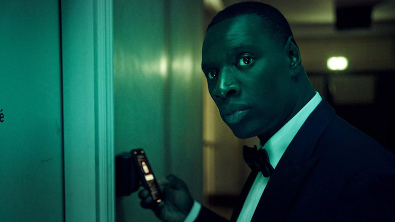 Oar Sy as Assane Diop in tuxedo in Lupin