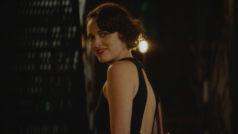 Phoebe Waller-Bridge as Fleabag turning back and smiling in "Fleabag" Season 2