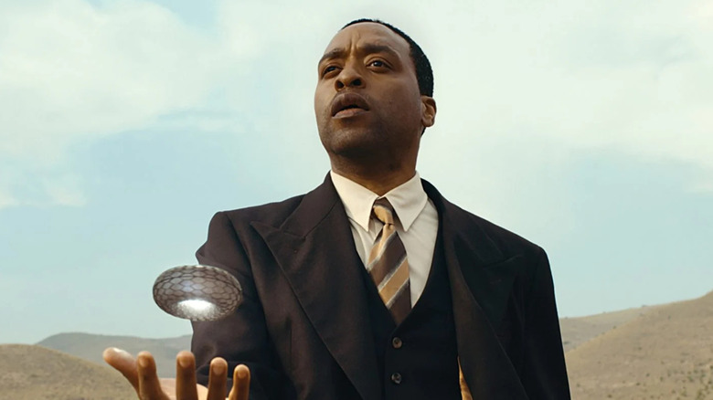 Chiwetel Ejiofor as Faraday with his hand under a floating ring in "The Man Who Fell to Earth."