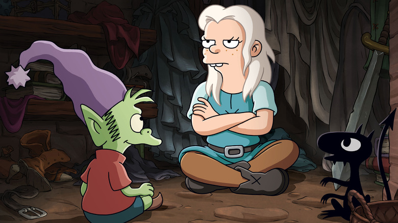 Bean sits with arms crossed while Elfo and Luci look at her