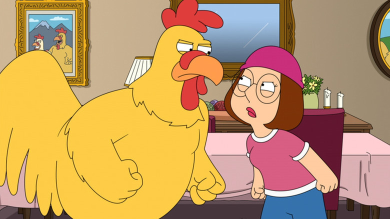 Meg stares down the giant chicken